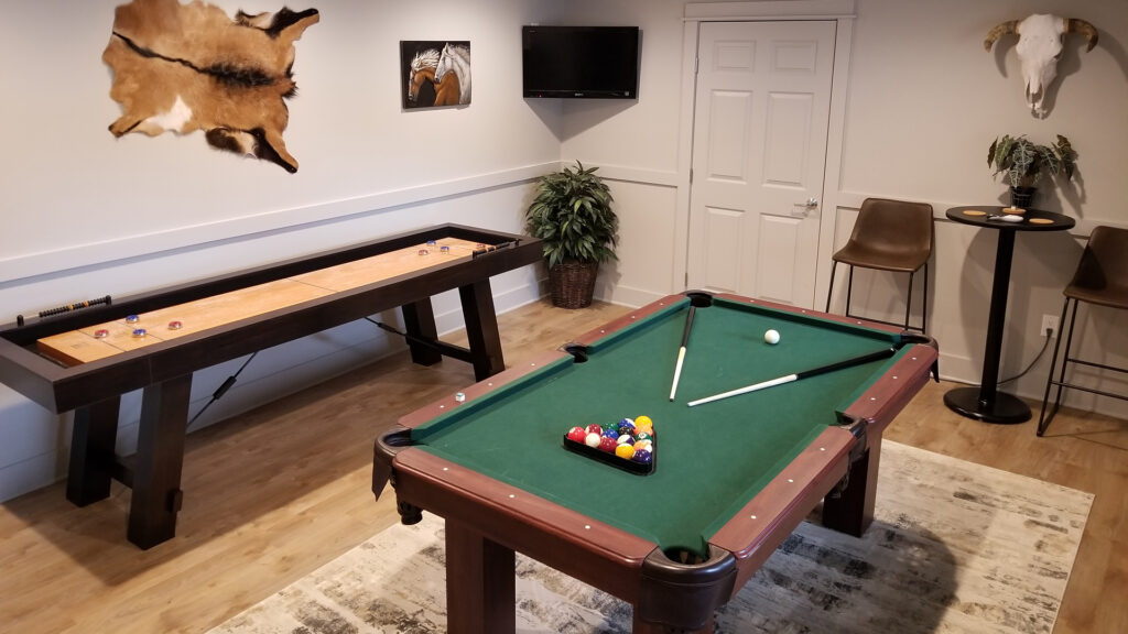 If you enjoy playing pool or shuffleboard while you watch the big game on TV, we've got you covered.