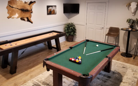 If you enjoy playing pool or shuffleboard while you watch the big game on TV, we've got you covered.
