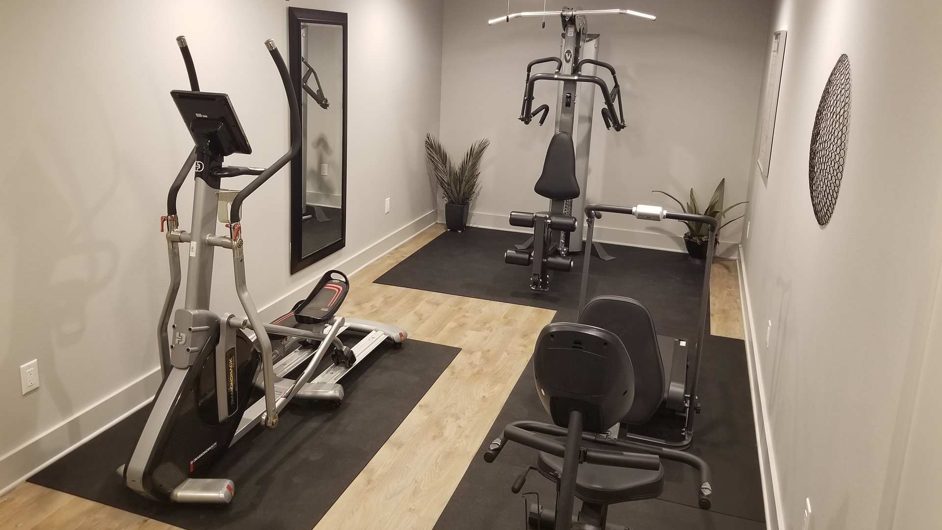 Our fitness center features a professional home gym, elliptical machine,  recumbent bike, treadmill, and large satellite TV. – Roadrunner Acres RV  Ranch