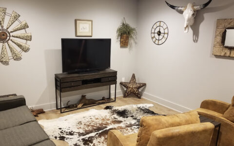 Tired of watching the small TV in your RV? Come relax in our dedicated TV room, which also boasts a drink and snack station.